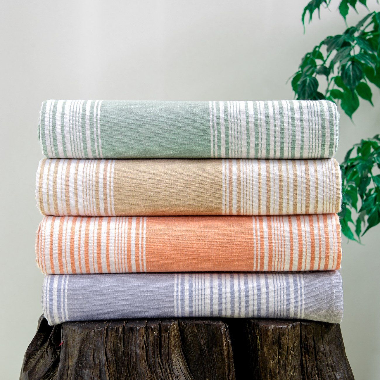 Close view of layered Huanghekou woven cotton fabrics