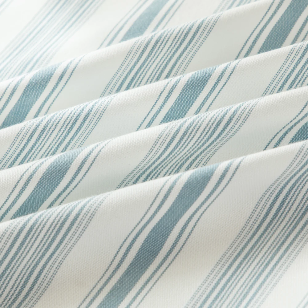 Close-up of blue yarn-dyed stripe fabric and woven texture