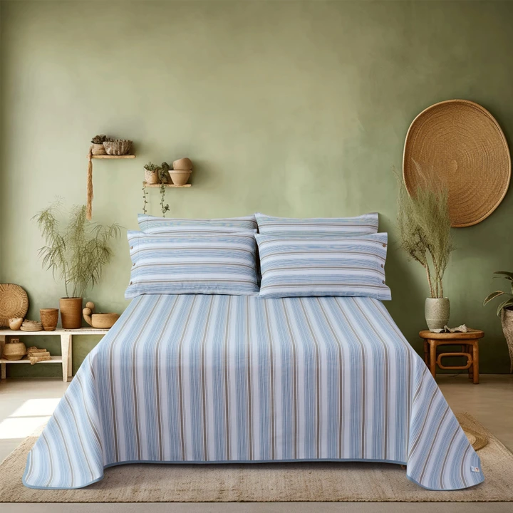 Blue fine-stripe cotton bedding with matching pillowcases
